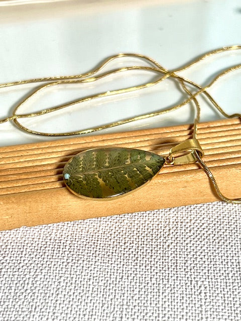 Drop pendant with fern leaf