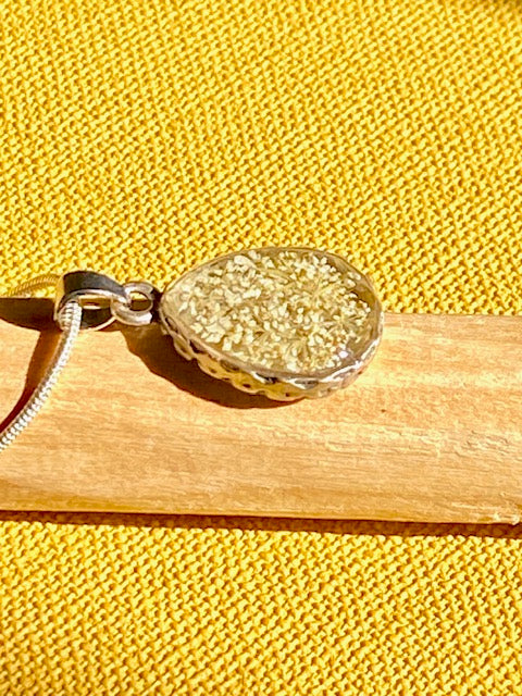 handmade nature inspired pendant with real flower 