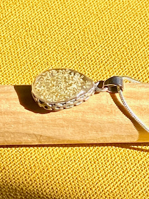 handmade nature inspired pendant with real flower 