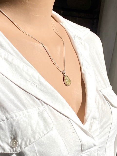 handmade nature inspired pendant with real flower 