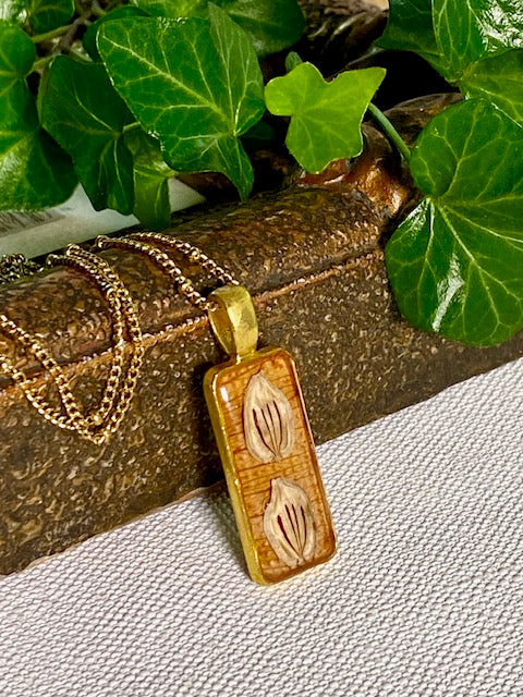 symboliek uit de natuur in deze prachtige hanger