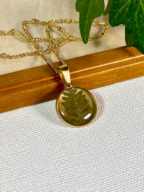 real fern in pendant gold plated