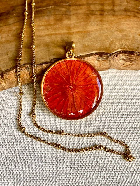 statement jewelry with real flower